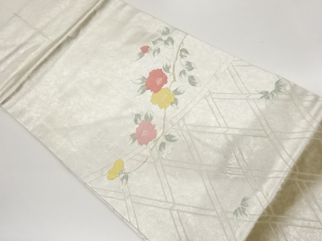 引箔竹垣に山茶花・笹模様織出し名古屋帯